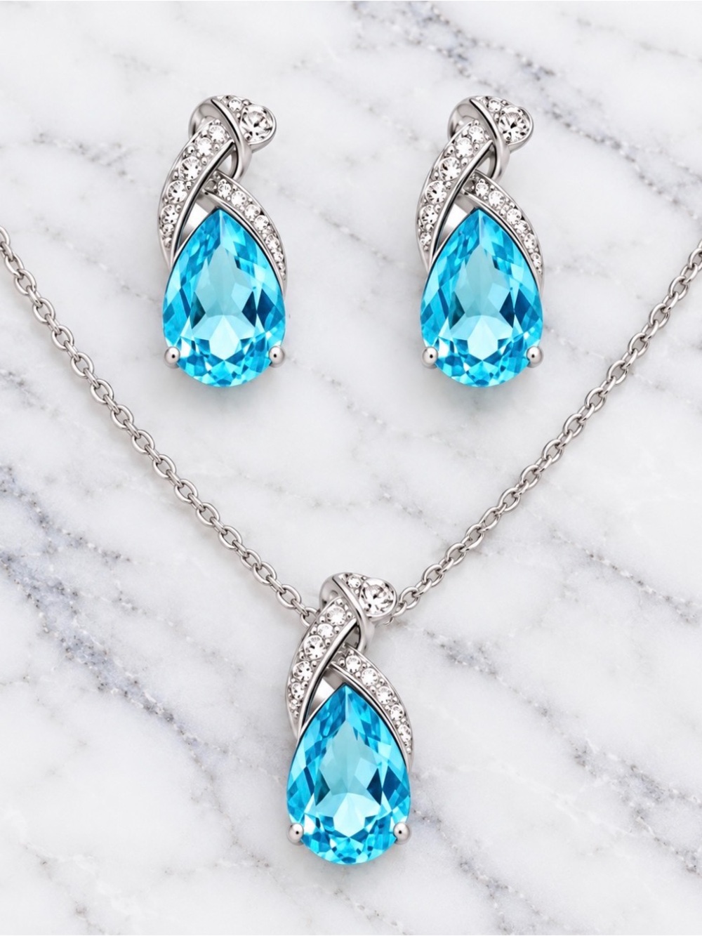 Silver Necklace and Earrings Set with Blue Teardrop Stones